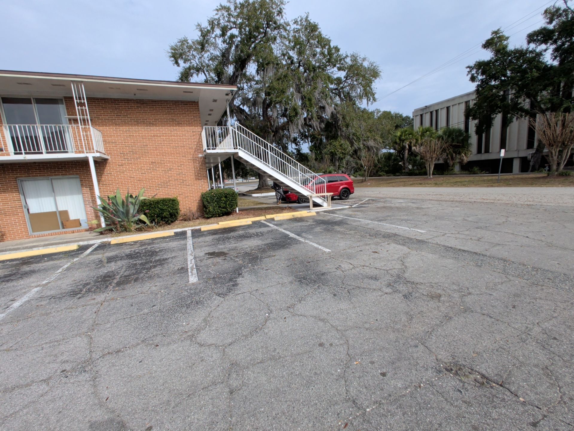 Apartment Landscape Cleanup & Ongoing Grounds Maintenance — Cimarron Apartments (Arlington) by Harmoni Home Services