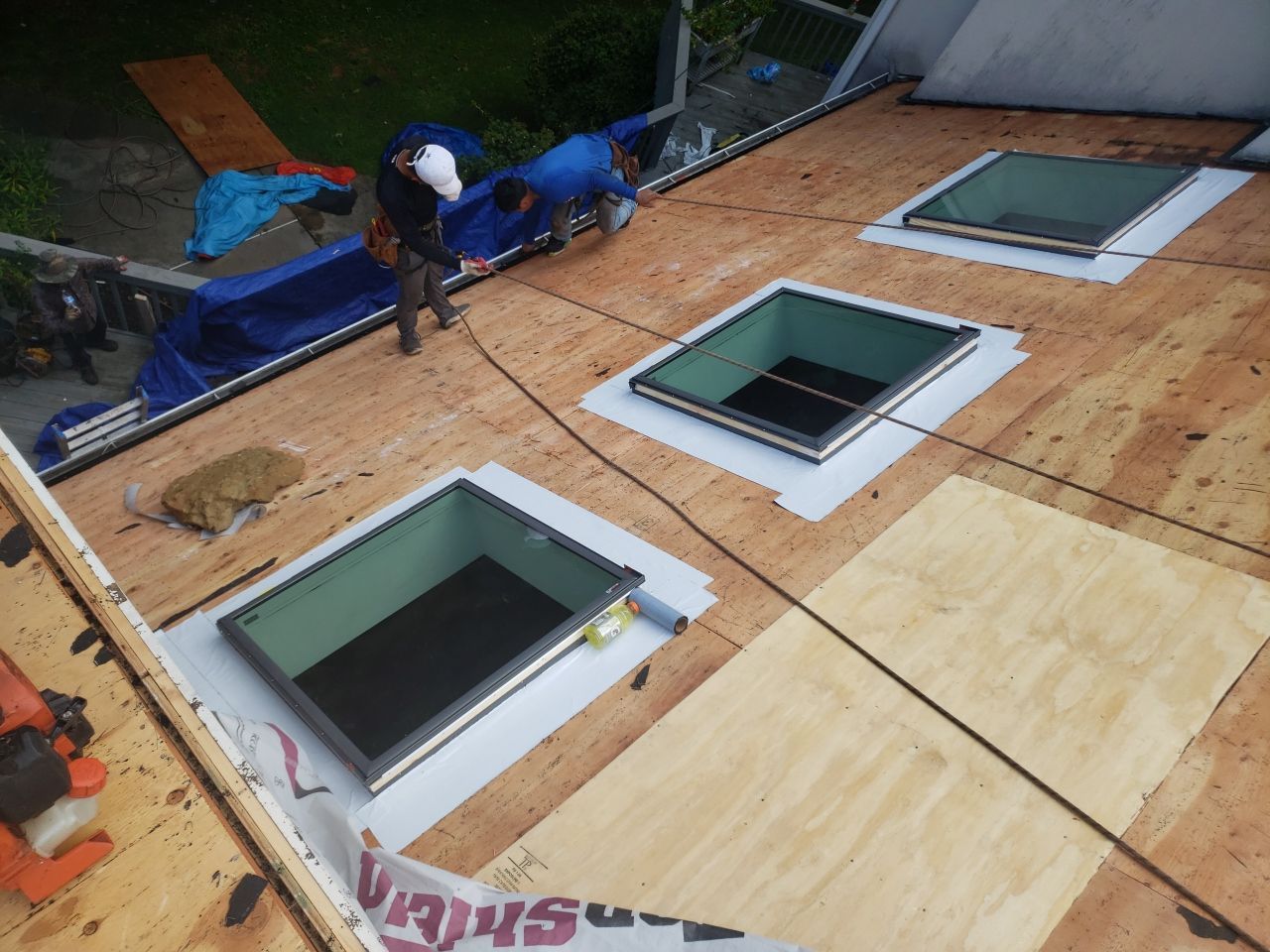 Skylight, Roof, and Gutter Replacement by American Home Contractors