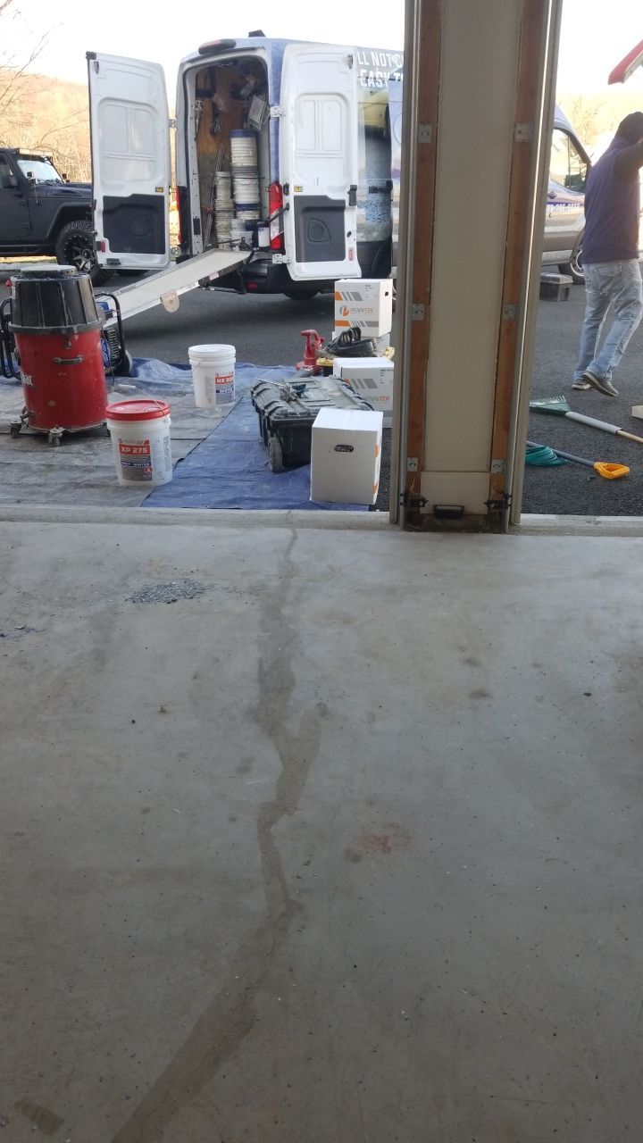Orbit Penntek Garage Floor by Spectrum Painting, LLC