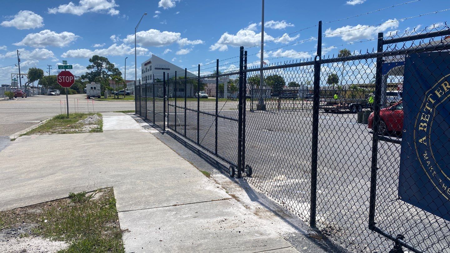 Parrish, FL 6+1 Black Commercial Chain-Link Fence by Asap fence and gates, LLC