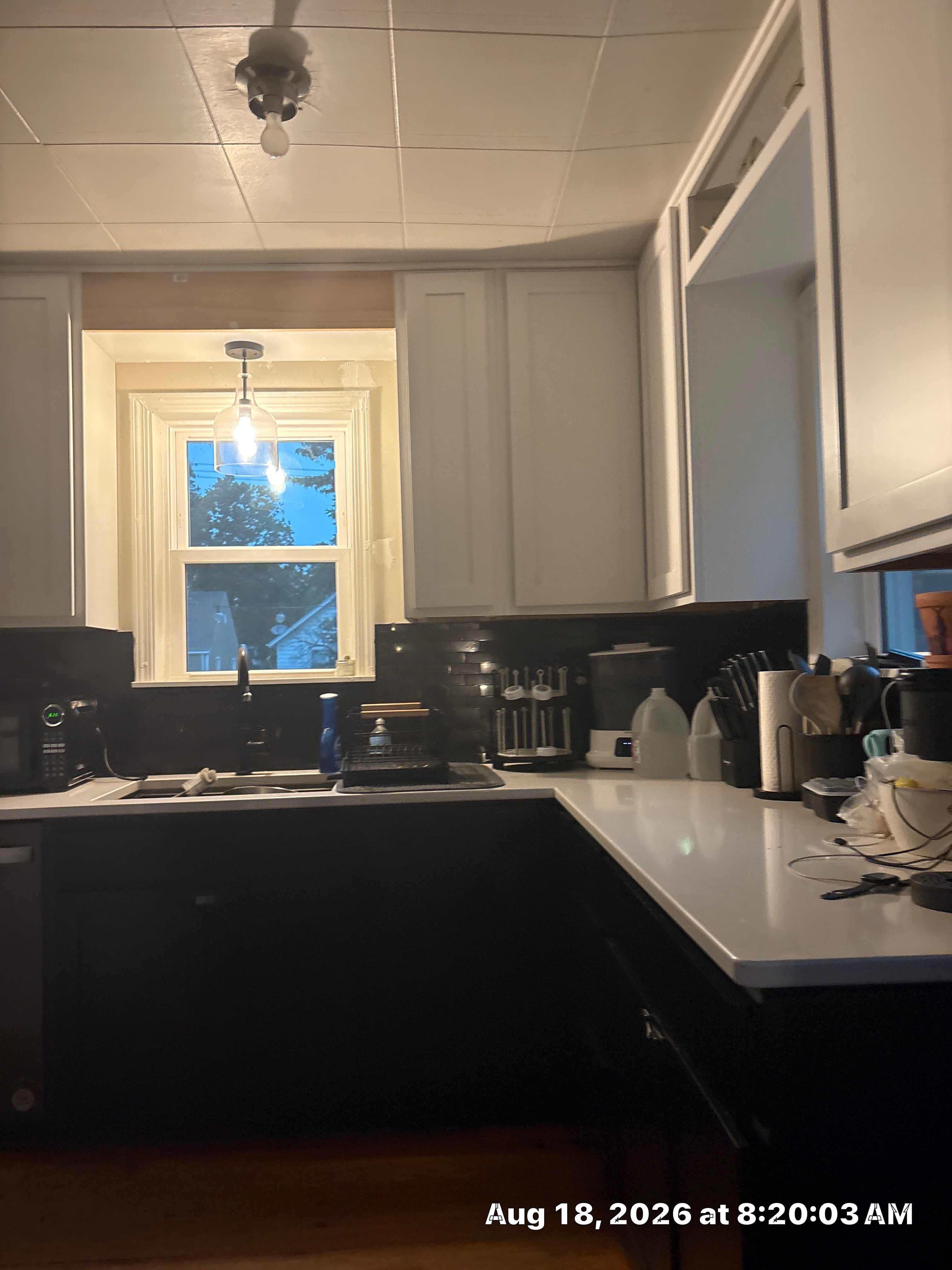 Lincoln Kitchen Renovation Featuring Black and White Shaker Cabinetry by CompanyCam Sales Demo