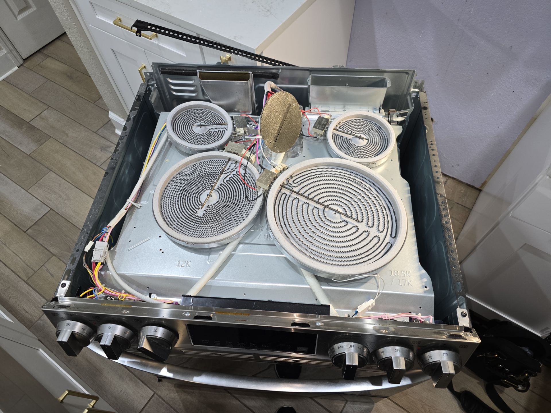 Chipped Glass Cooktop  by AMB-WORKS APPLIANCE REPAIR