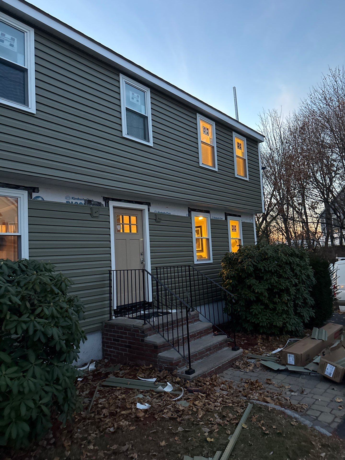 Complete Exterior Home Transformation with CertainTeed Dutch Lap Siding, Windows, Custom Door & Deck Repairs by Sensible Home Solutions