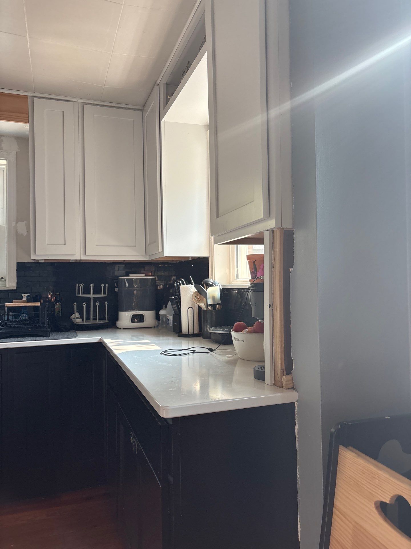 Lincoln Kitchen Remodel With Black and White Two-Tone Cabinetry by CompanyCam Sales Demo