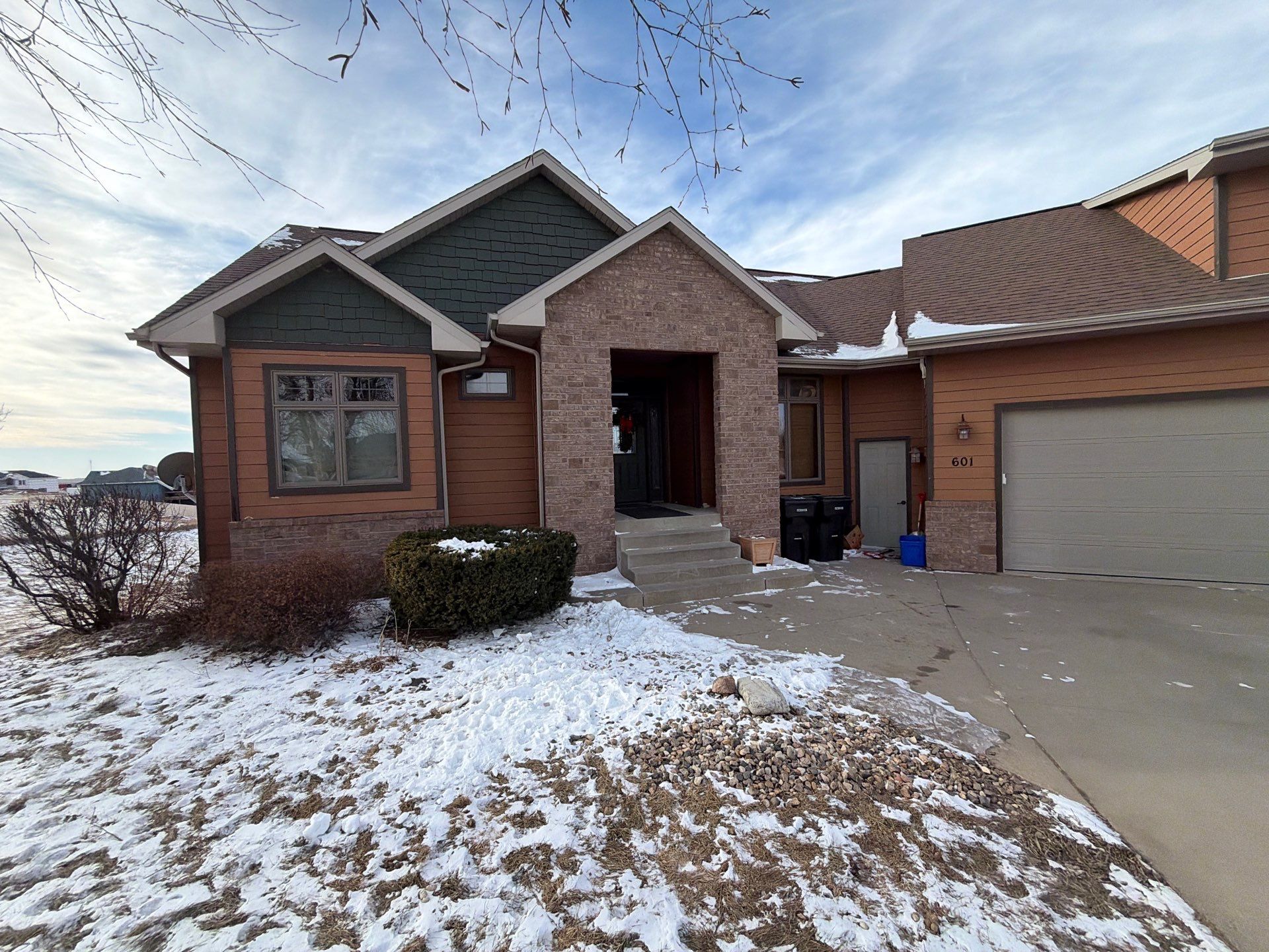 Residential Exterior Painting and Siding Restoration in Crooks by Select Painting, Coatings & Garage Cabinets