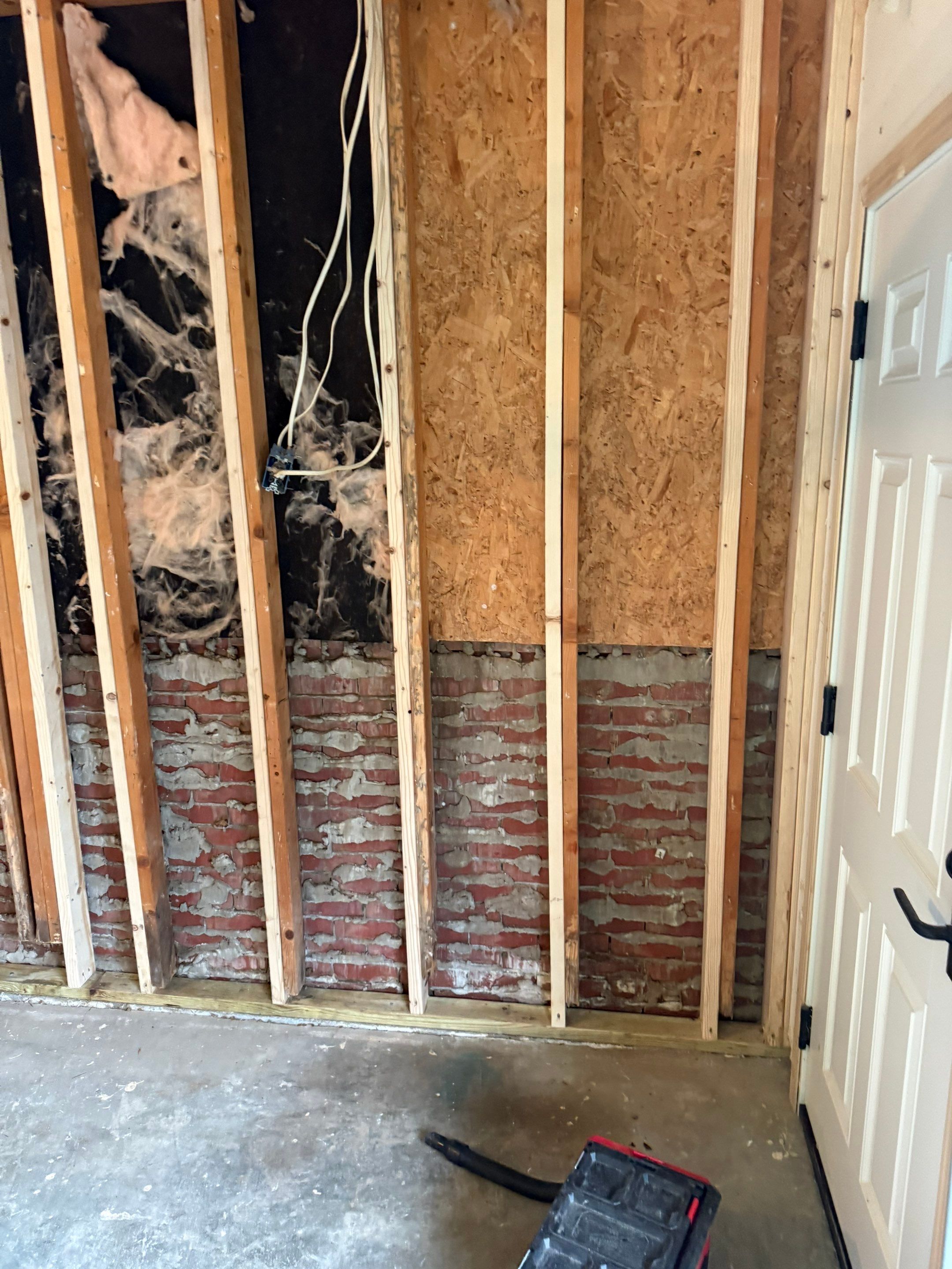 Yankton Garage Remodel with Andersen Window Installation and Drywall by Select Painting, Coatings & Garage Cabinets