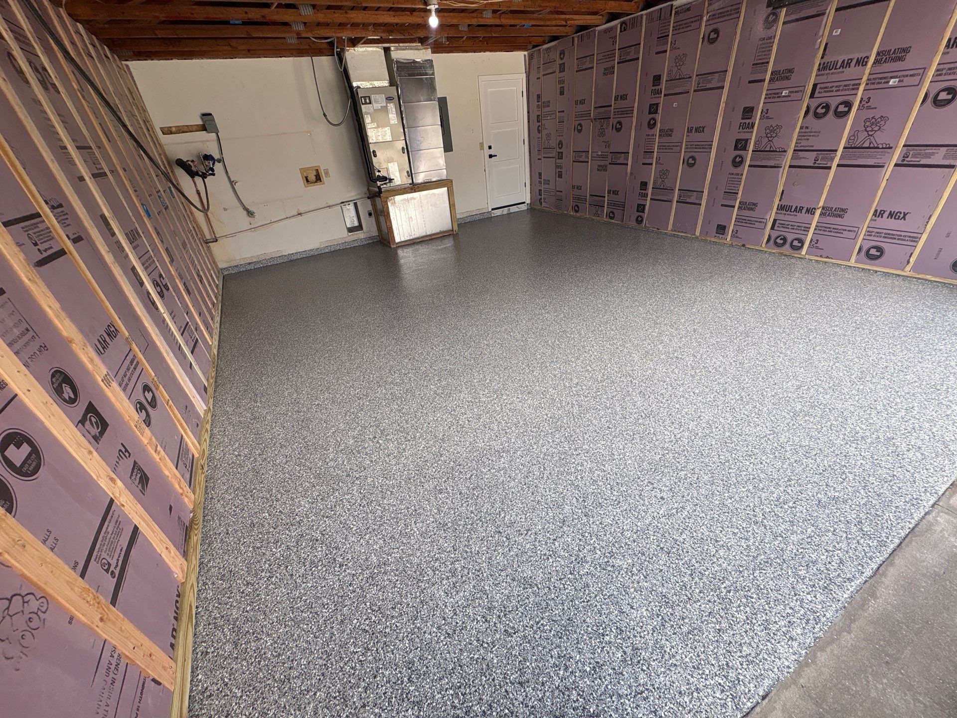 Gravel Flake Epoxy Garage Floor Installation in Brandon, Florida by Performance Floors & Coating