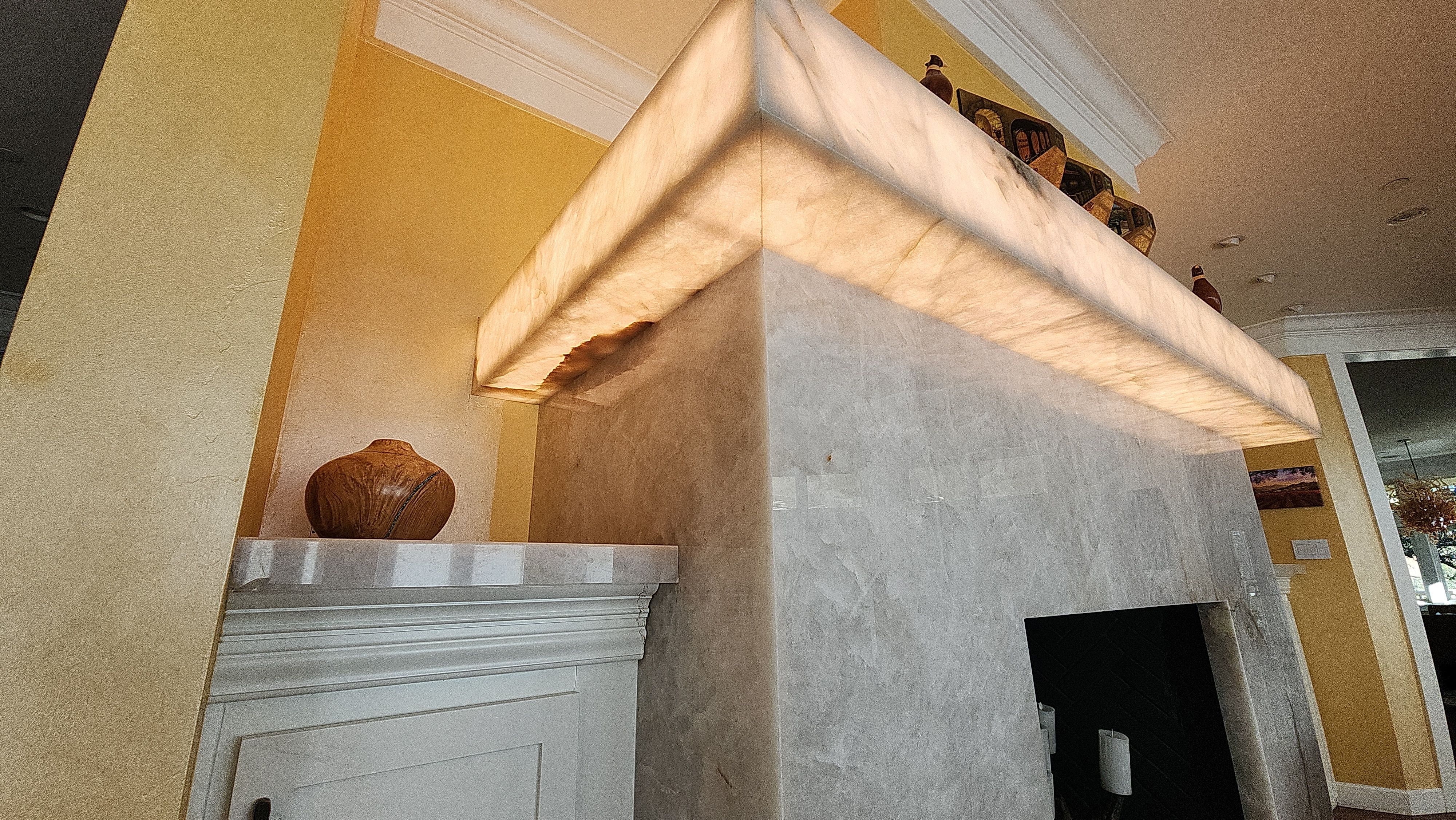 Backlit Stone On A Fireplace  by S.Y. Electric Inc.