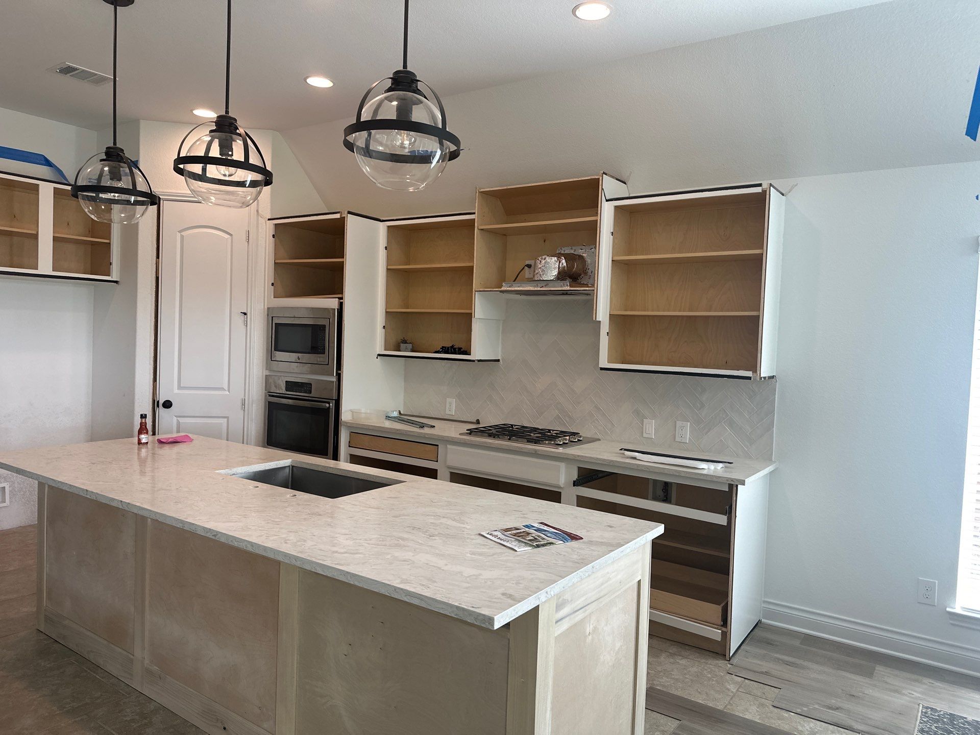 Kitchen Remodel using Water mitigation equipment by L&T General Contractors and Restoration INC
