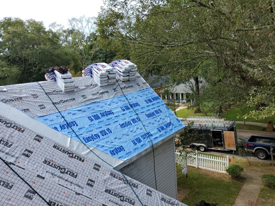 Residential Roofing Installation using Roof Replacement by American Roofing & Construction LLC