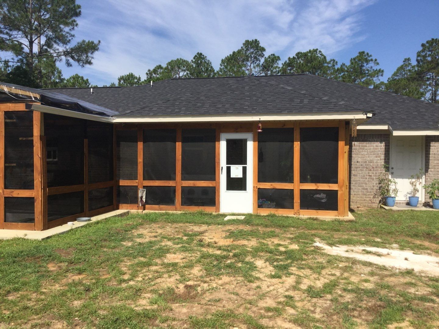 Downspout Installation using White Down Spouts in Milton FL by Gutter Professors
