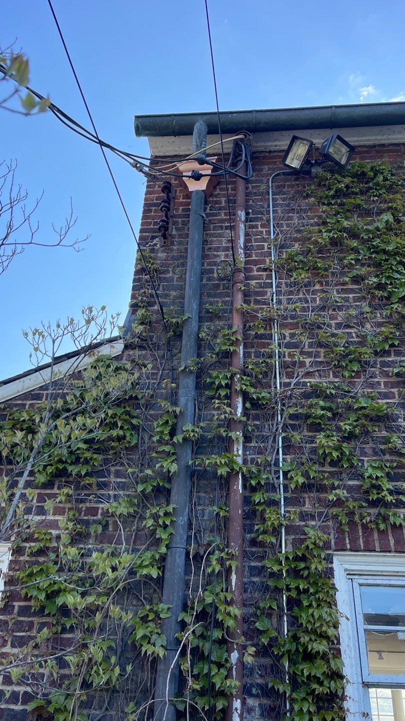 Copper Leader heads in Lawrence New York by Above All Gutters 