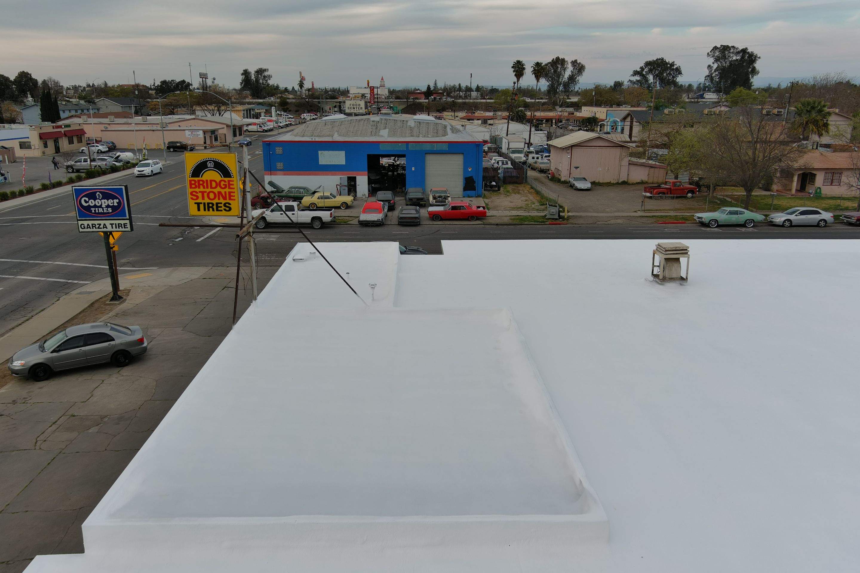 Spray foam and coatings using Conklin Benchmark/PUMA XL coatings and spray foam by Straight Edge Roofing Inc