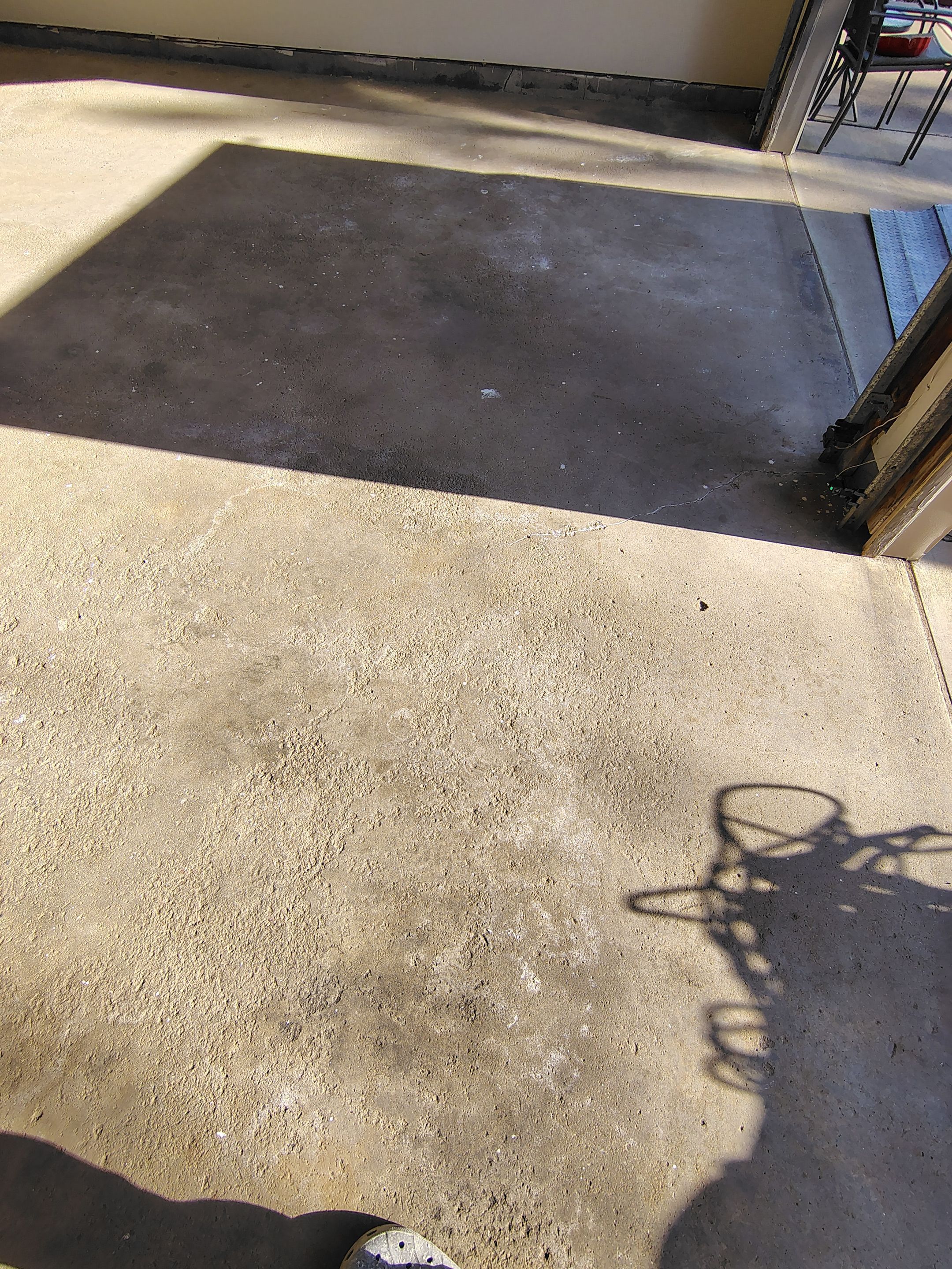 Full-Flake Epoxy Garage Floor Coating Installation in Sioux Falls by Select Painting, Coatings & Garage Cabinets