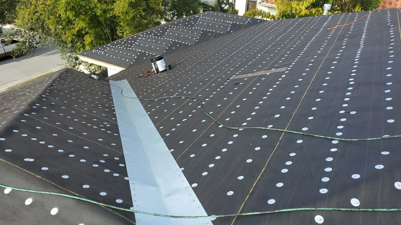 Concrete Tile Roof Replacement and Decking Repair in Boca Raton by Aastro Roofing