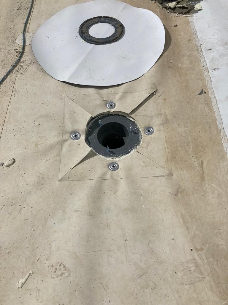 Drain Installation at CJ BIO by Grell Roofing, LLC