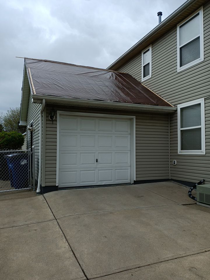 EMERGENCY TARPING ROOF BEFORE STORM using TARP by Absolute Roofing and Construction