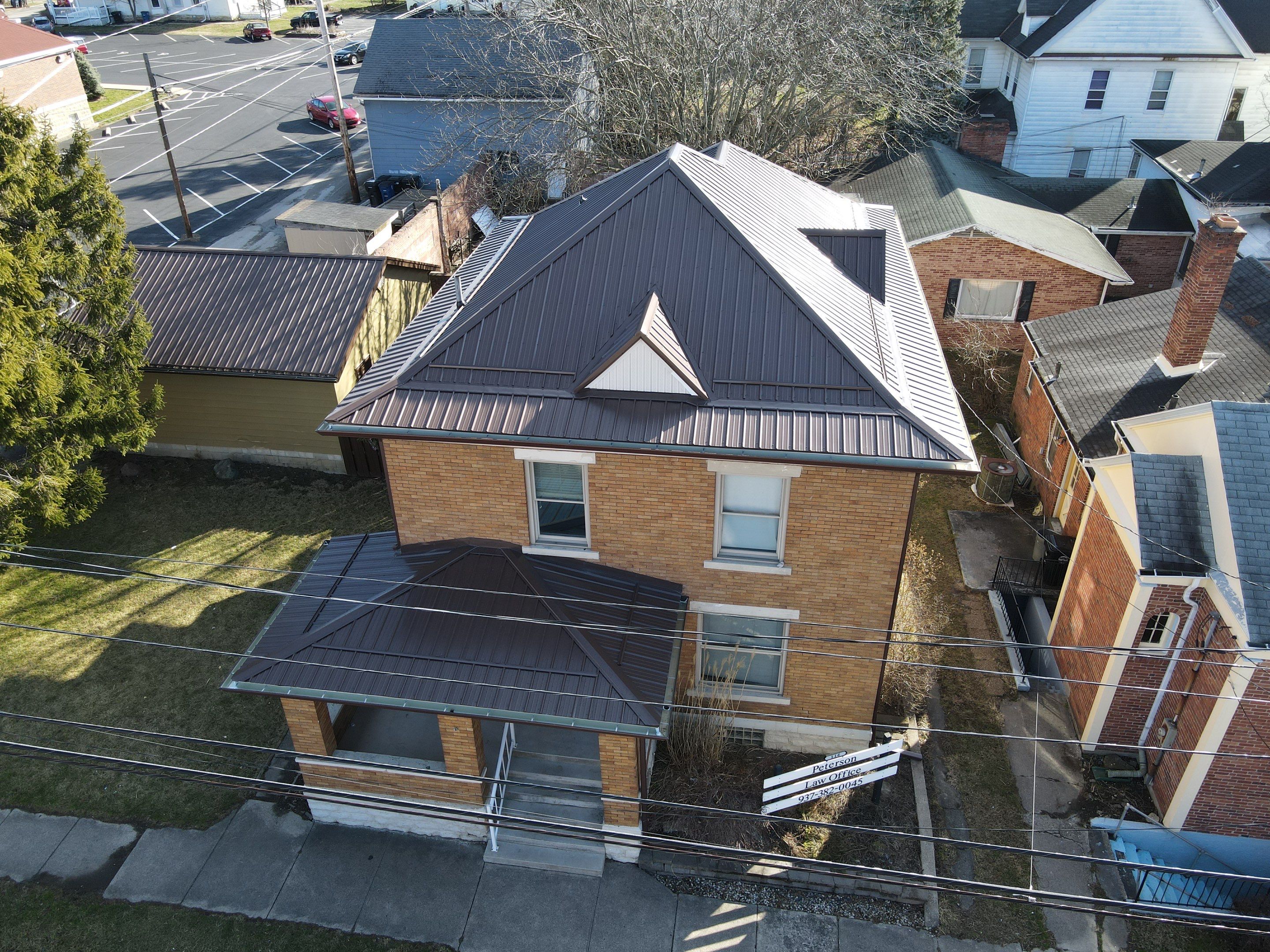 Residential Roofing Installation using Performance Panel Metal - Brown by RoofX