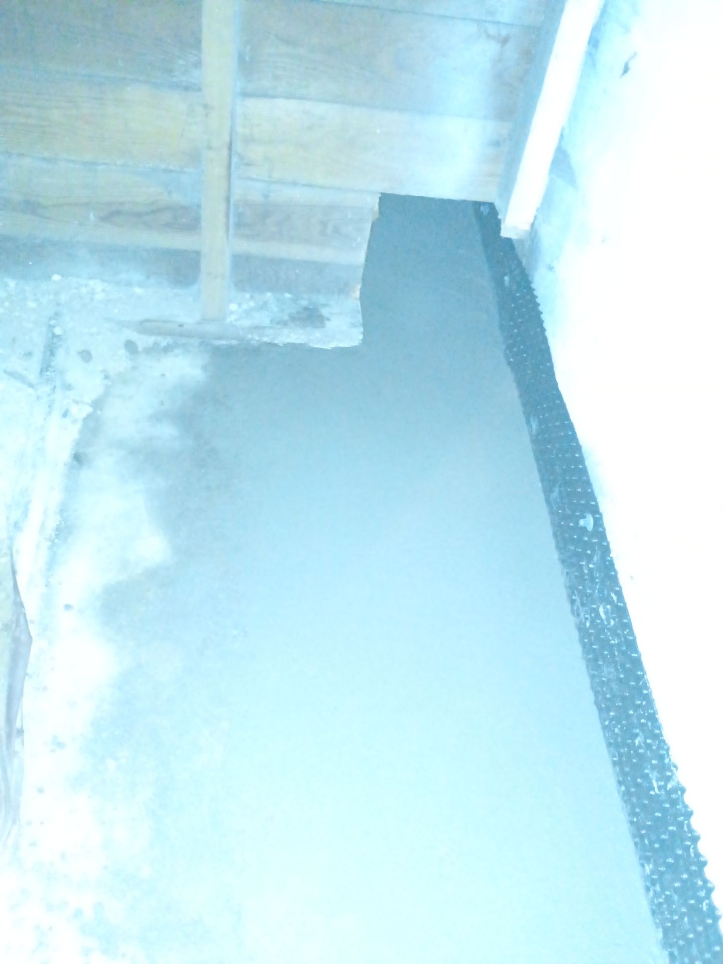 Interior Drain Tile & Sump Pump System in North Minneapolis by Waterproofing Northeast