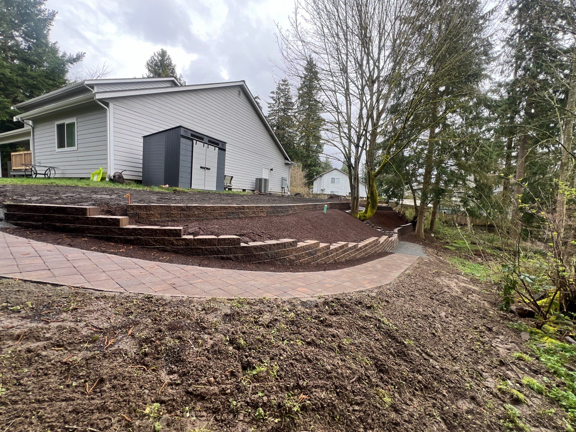 Retaining Wall and Backyard Renovation | Everett  by Jireh Asphalt & Concrete Inc 