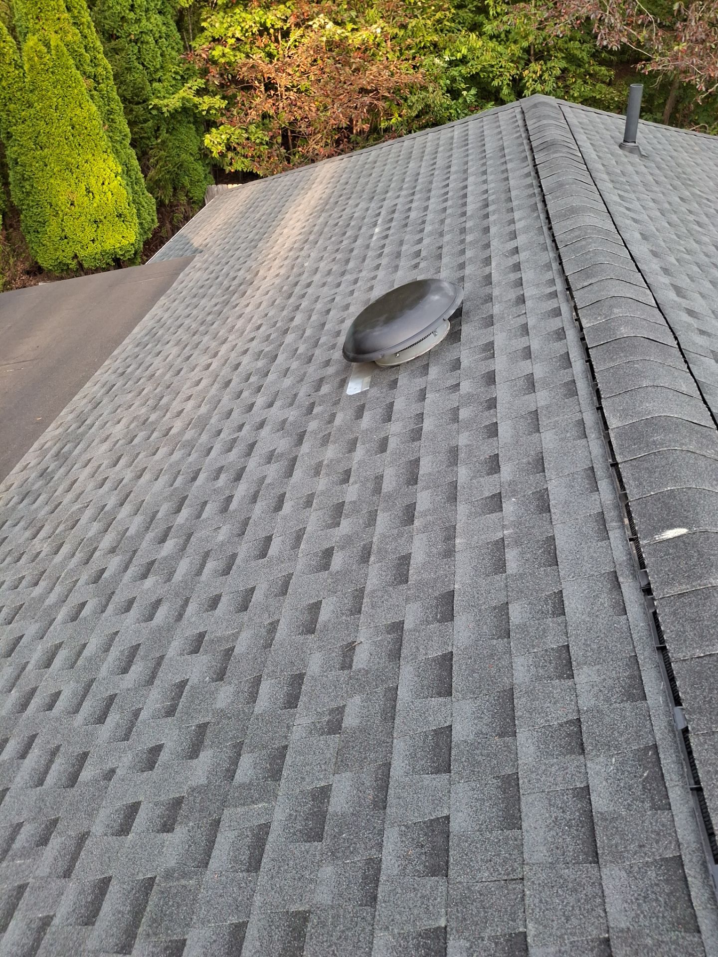 Residential Roofing Installation using GAF Timberline HDZ Charcoal by Rainstoppers Roofing