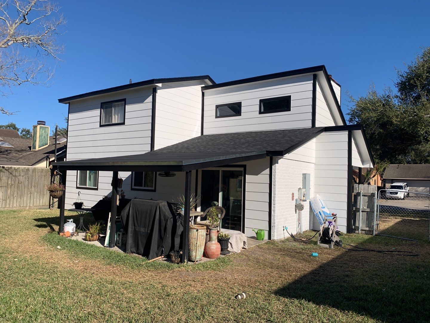 Exterior Transformation- Full Roof Replacment and James Hardie Siding Project by Galvan Roofing and Construction