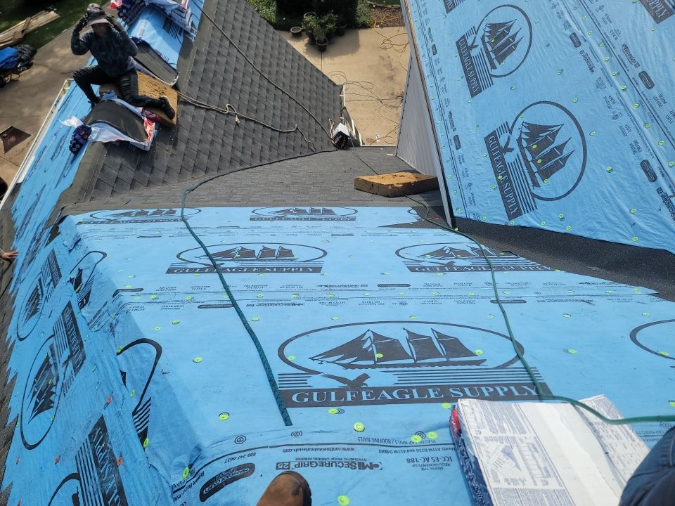 Residential Roofing Installation using Roof Replacement by American Roofing & Construction LLC