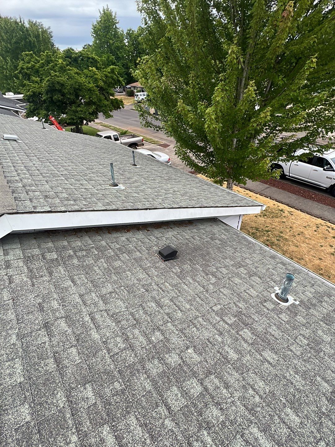 Residential Roofing Installation using IKO Dynasty (Color: Frostone Grey) by Orezona Building & Roofing Company, Inc.