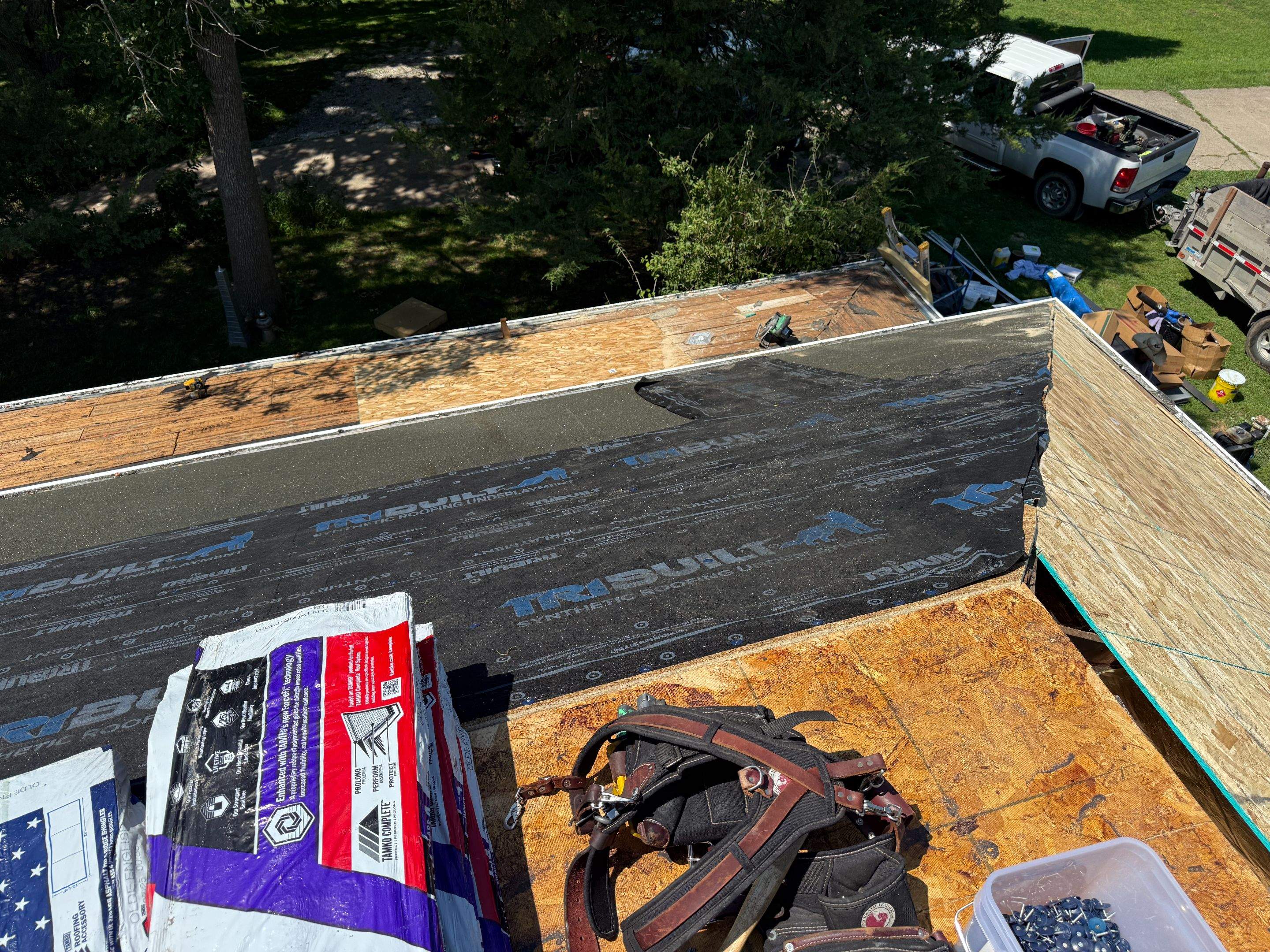 Asphalt Shingle and EPDM Membrane Roof Installation in Mineola by Star Home