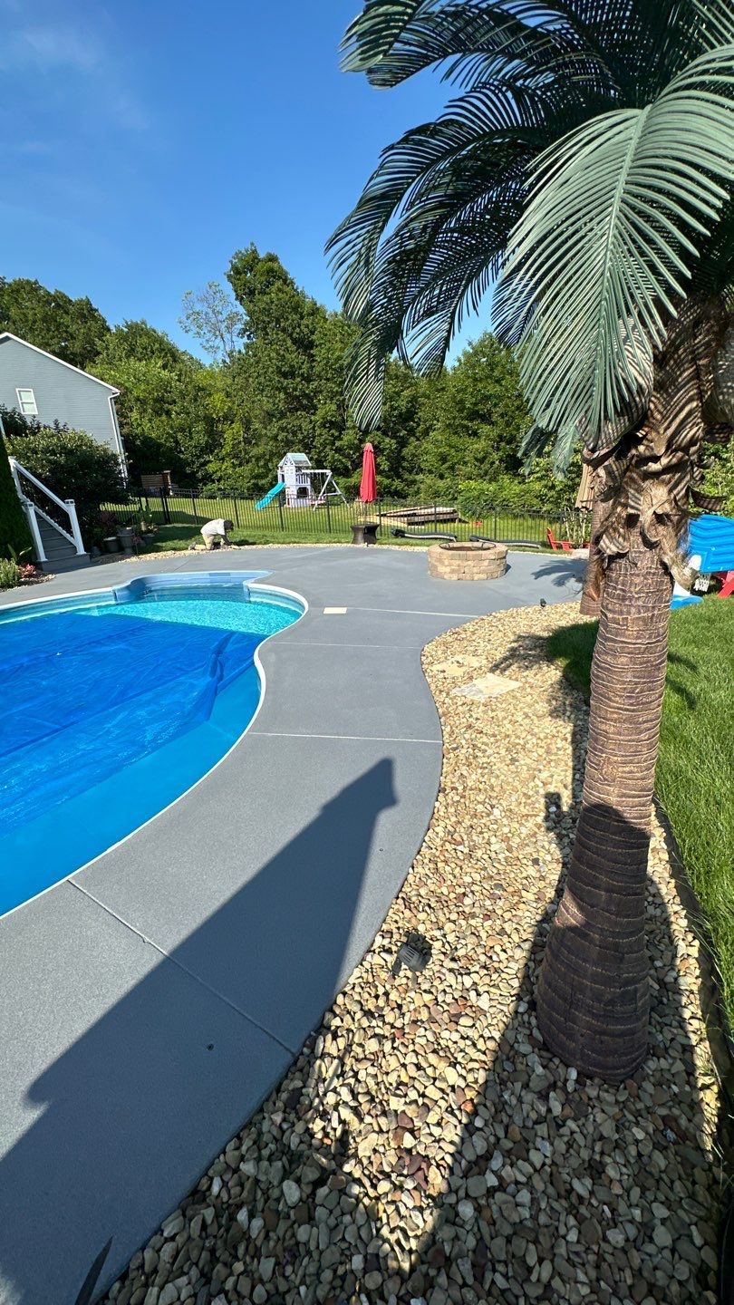 Twilight Pool Deck / Patio Project in Beaver falls by Floors in a Day, Inc