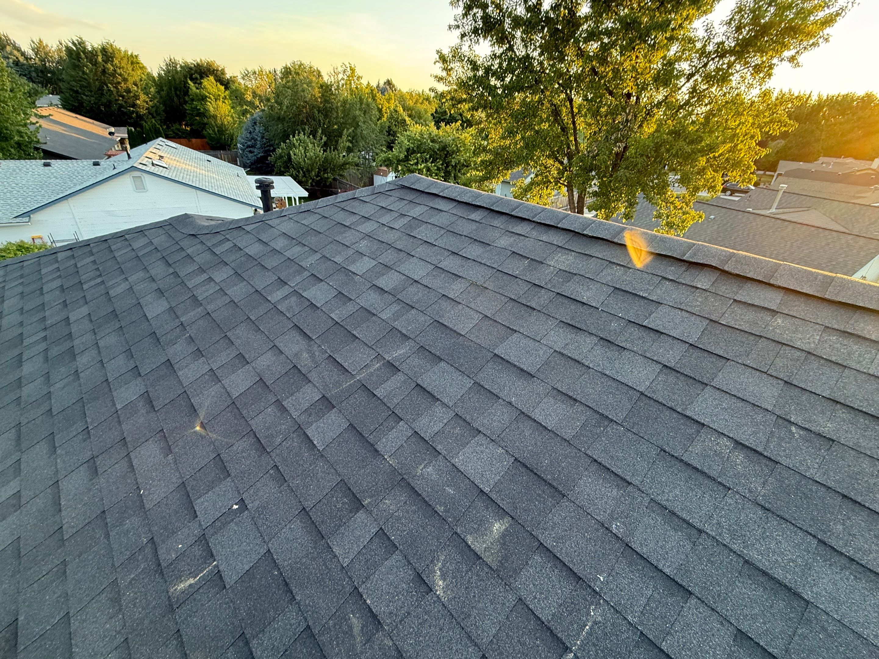 Residential Roof Replacement and Seamless Gutter Installation in Boise by Olive Roofing