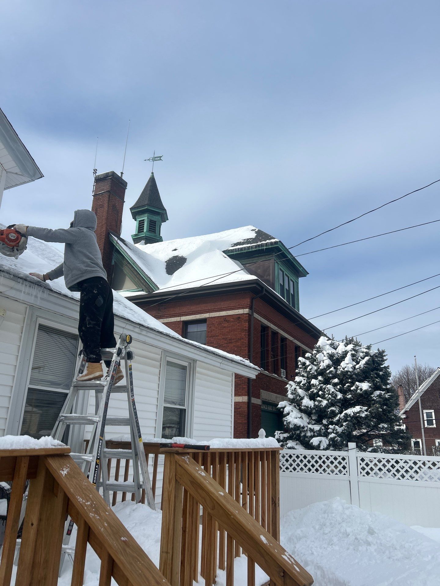 Emergency Snow Removal & Roof Tarp Installation in Lawrence, MA by Mighty Dog Roofing of Greater Middlesex County