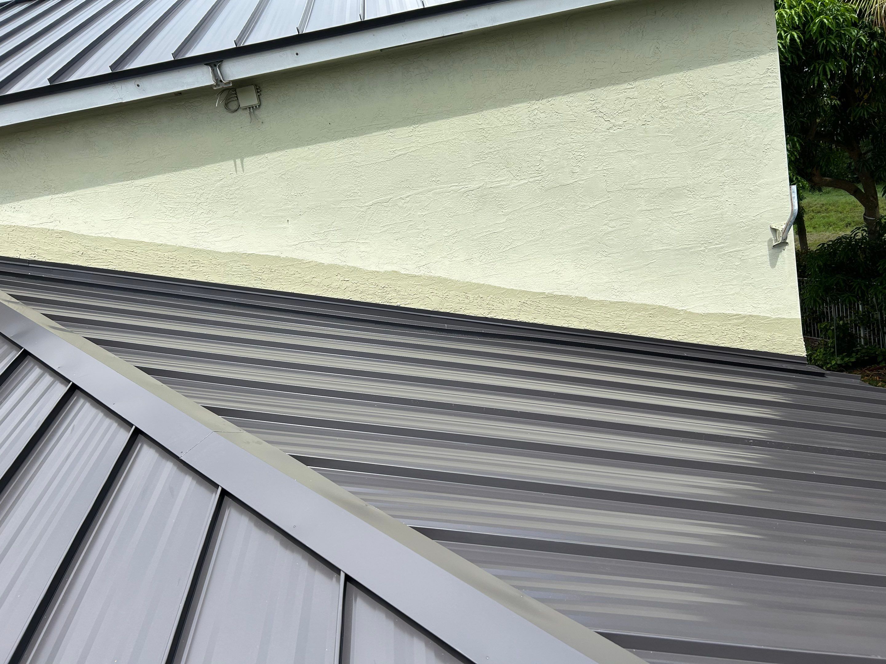 24ga 1.5" Mechanical Seam Dark Bronze by Total Roofing System The Metal Roof Experts