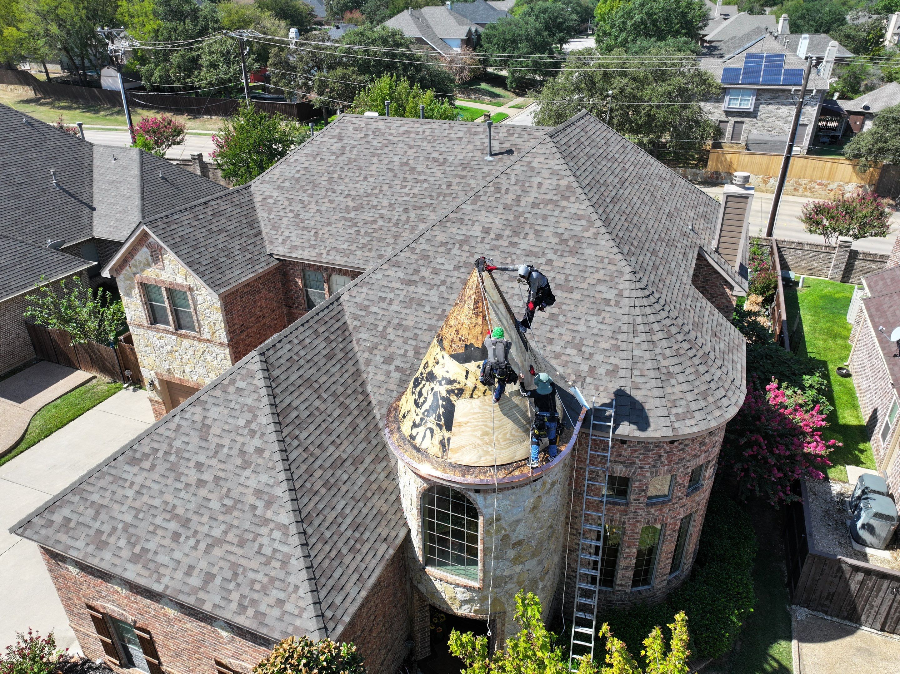 Installing Custom copper turret and Malarkey Vista Class 4 shingles Hail Damage Upgrade by Becker Roofing and Exteriors