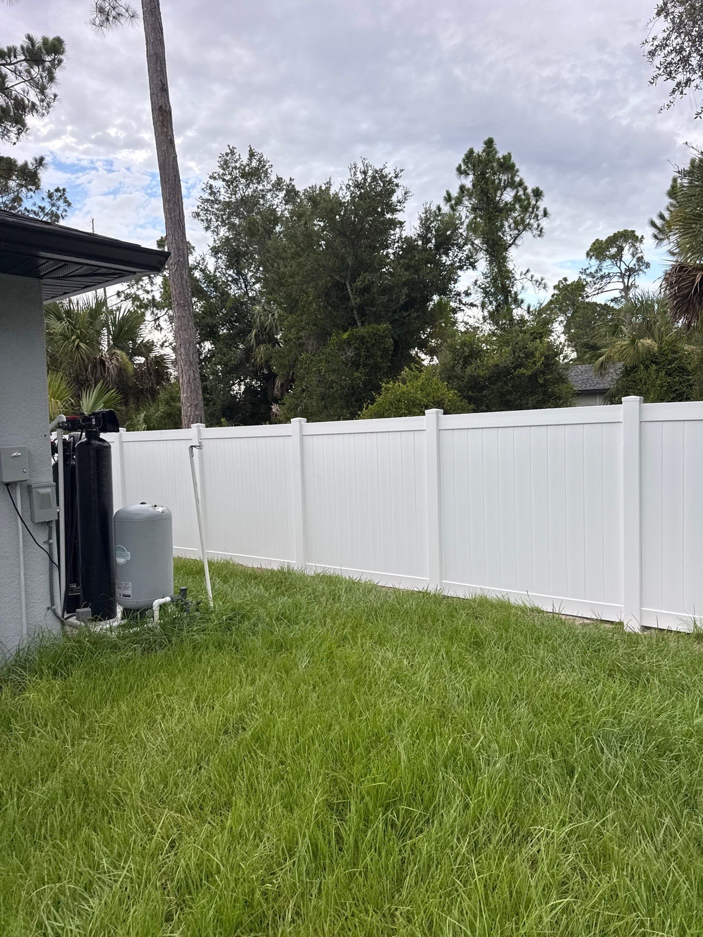 White Vinyl Privacy Fence Installation in North Port by True Fence LLC