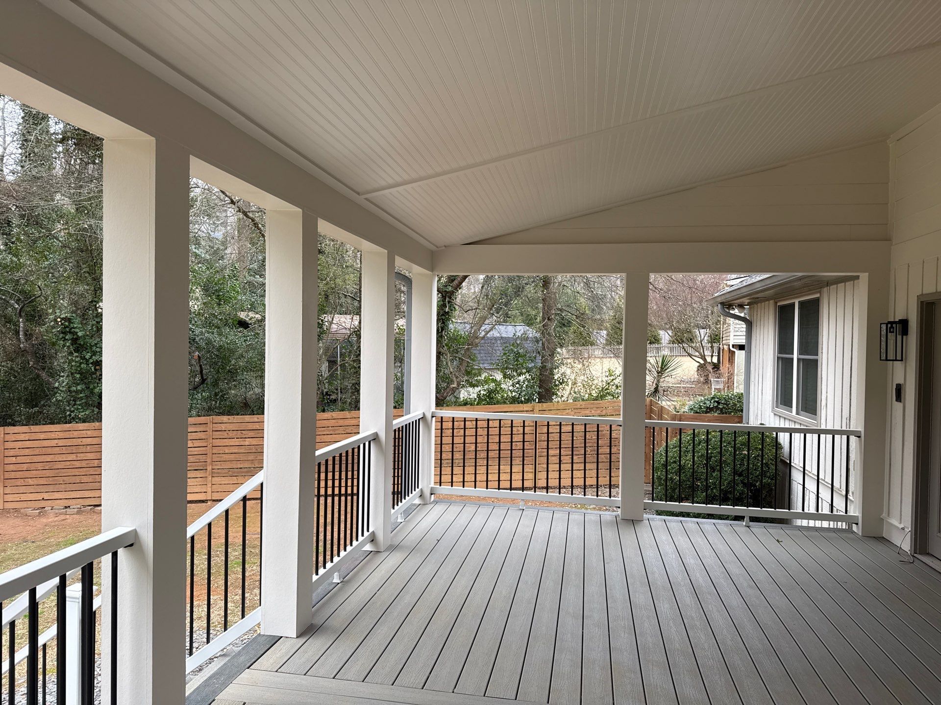 Deck and Shed Roof Style Covered Build using Trex Decking Products by Nelson Exteriors 