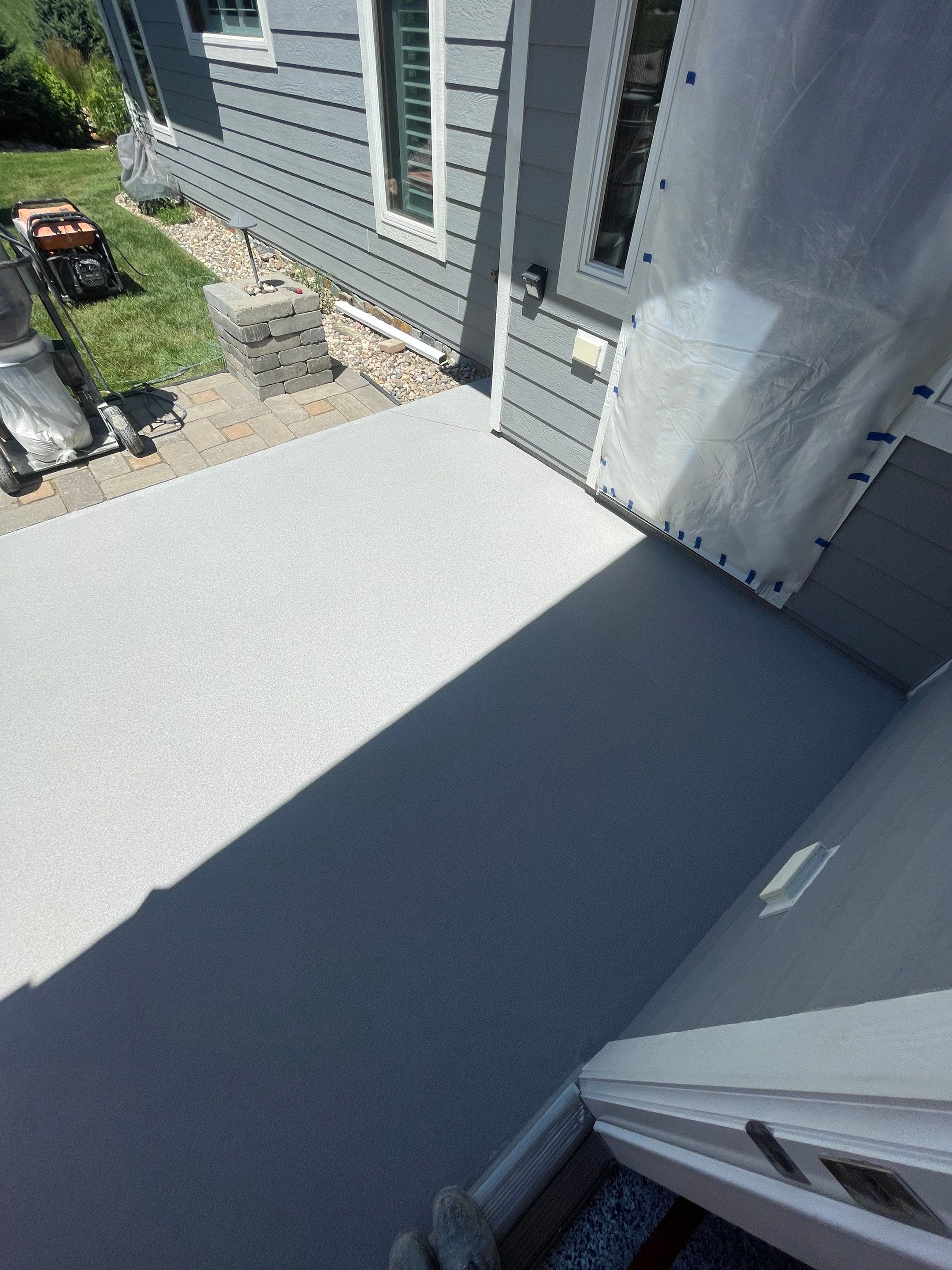 Concrete Patio Coating with Fuzzy Wool Finish in Sioux Falls by Select Painting, Coatings & Garage Cabinets
