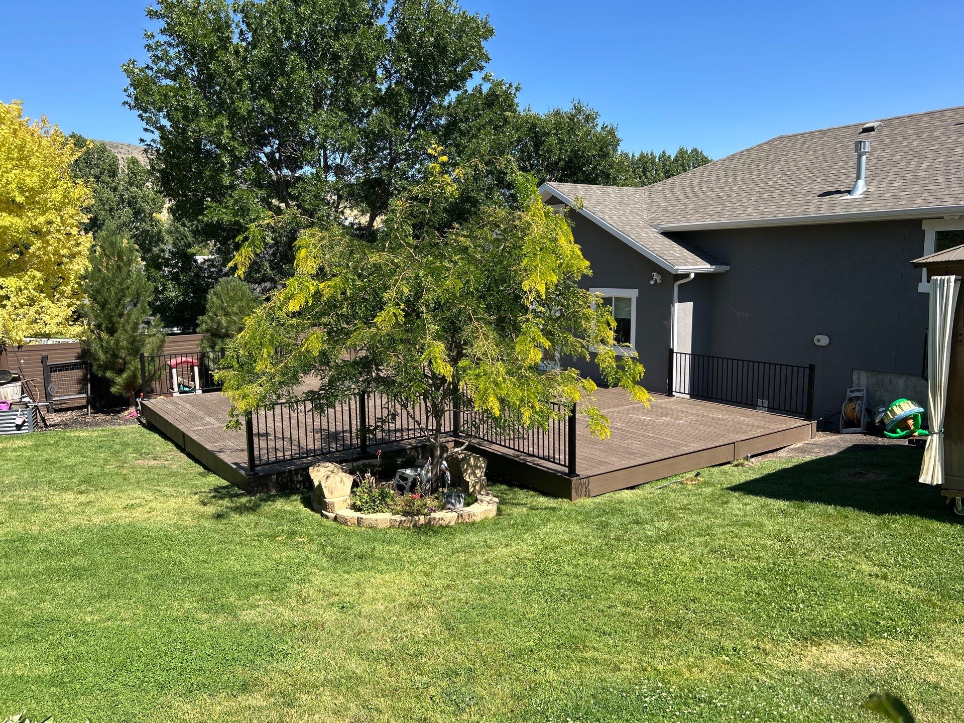 Deck Build Over Concrete Patio by SAGE Decks