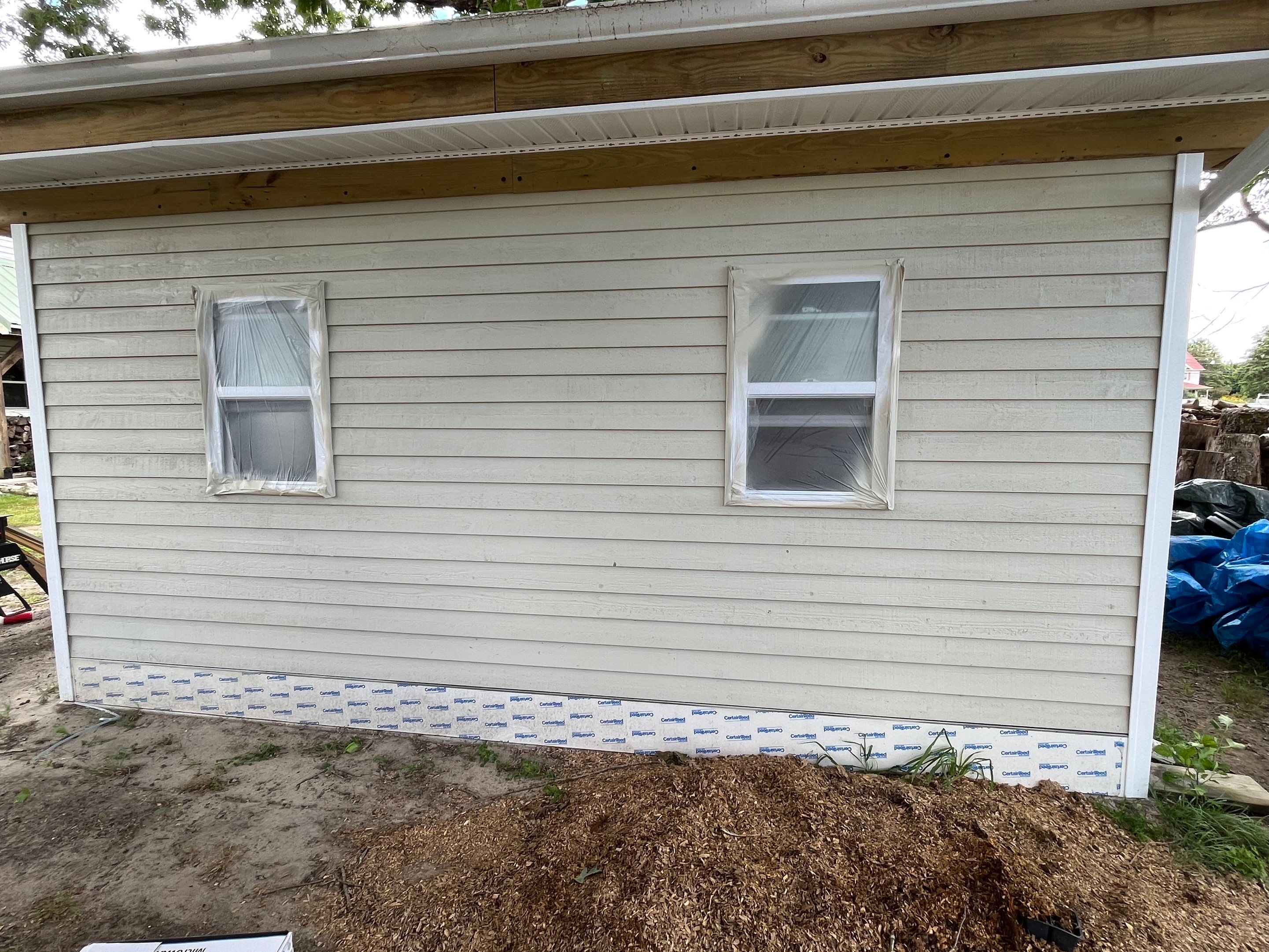 Exterior House Restoration - Marmora by FreshCoat Works LLC