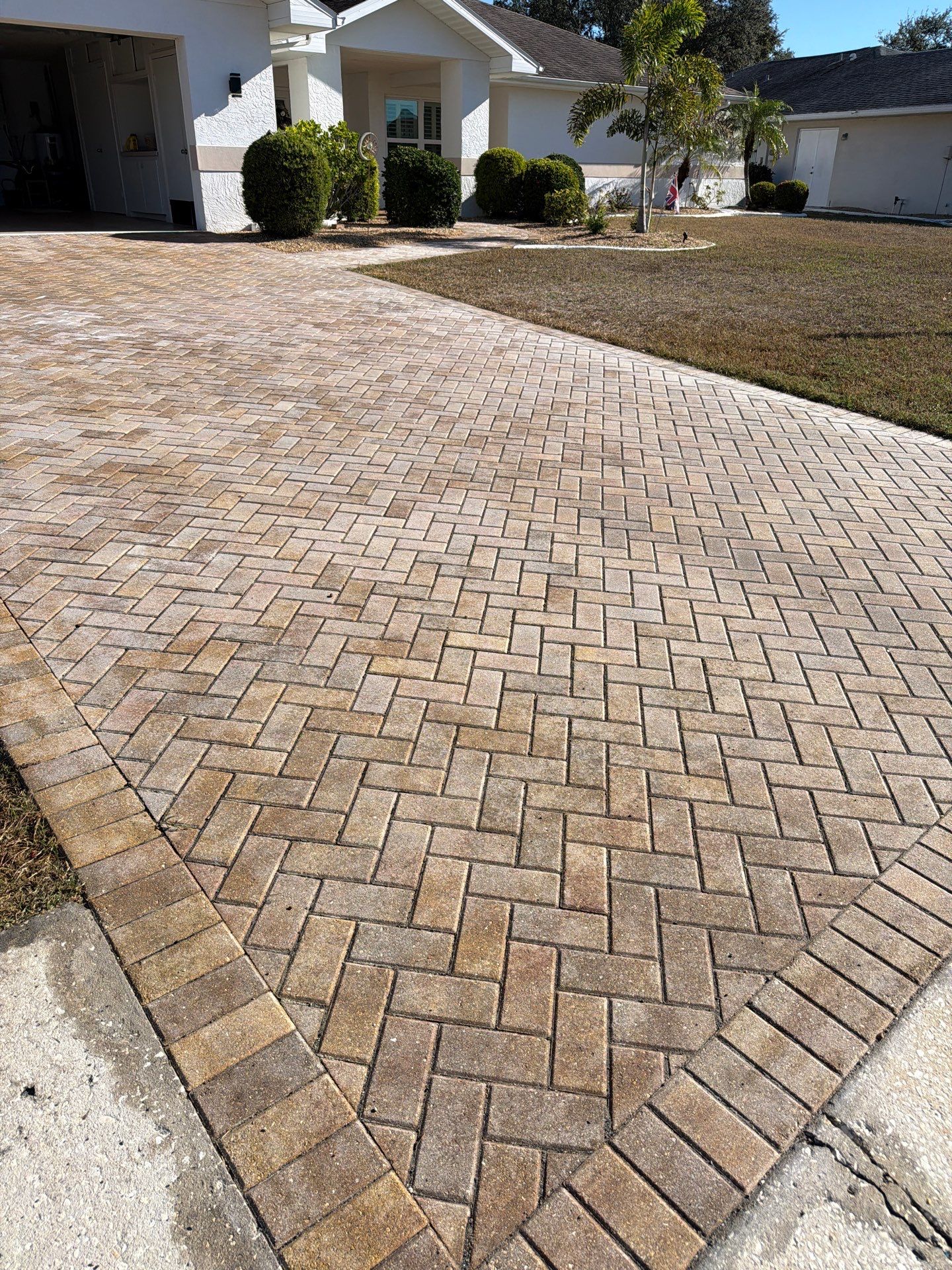 Restoring Herringbone Paver Driveway and Walkway in Sun City Center by Supreme Paver Experts
