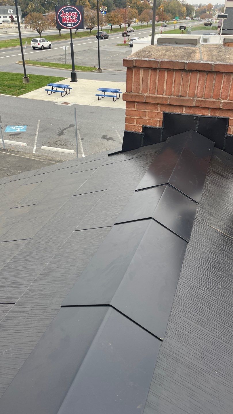 Tesla Solar Roof on a Commercial Building by American Home Contractors