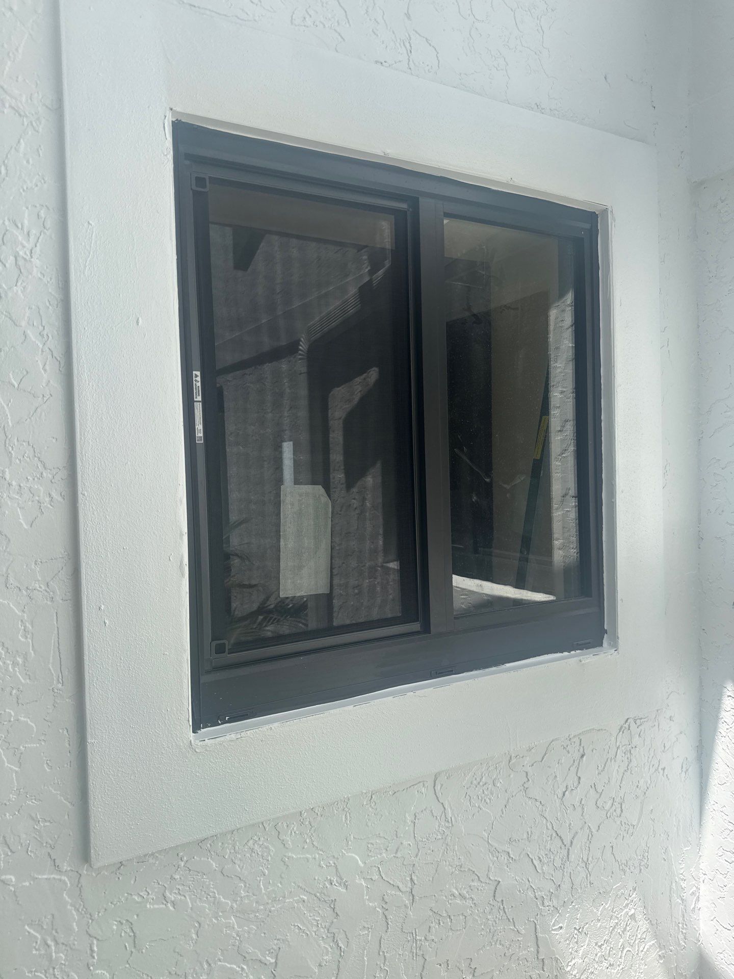 Impact Window and Sliding Glass Door Installation in Boynton Beach by The Screen Depot, Inc