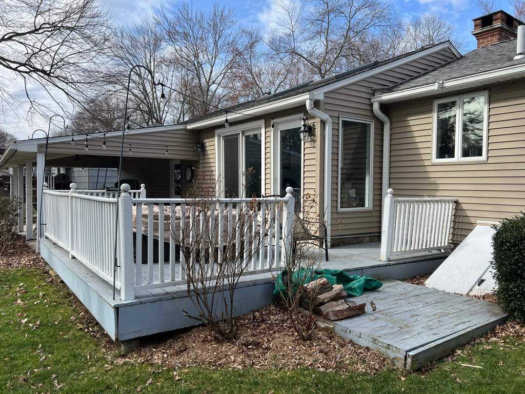 Deck Replacement with Trex Tropical Island Mist , matching cocktail rail and lattice bottom by DiGiorgi Roofing and Siding Inc