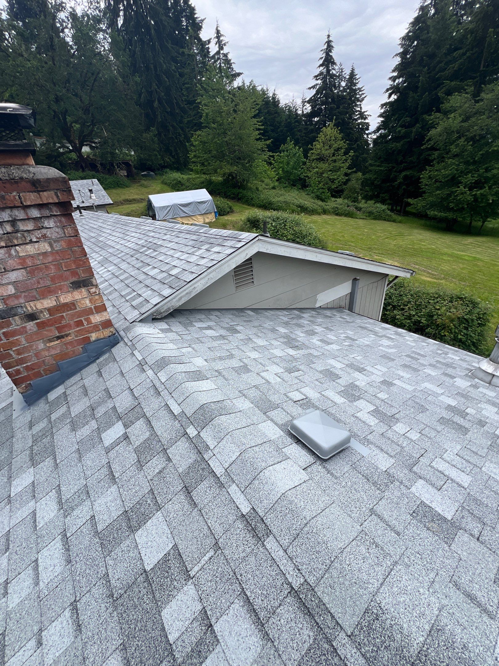 Residential Roofing Installation using IKO Dynasty (Color: Frostone Grey) by Orezona Building & Roofing Company, Inc.