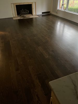 New Flooring installation  using 4" White oak select grade plain sawn Ebony Stain