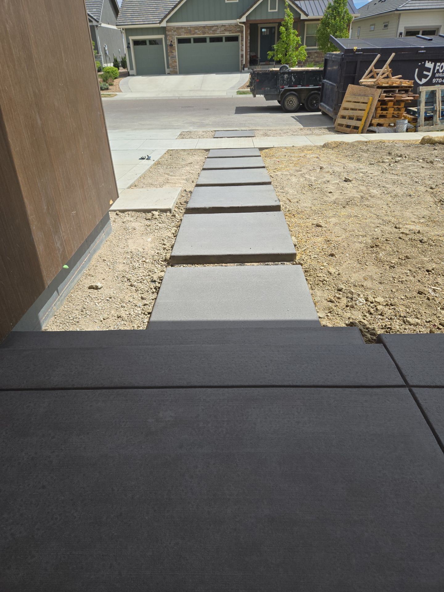 Stamped Concrete Patio and Custom Walkway Installation in Berthoud, Colorado by Center Line Concrete