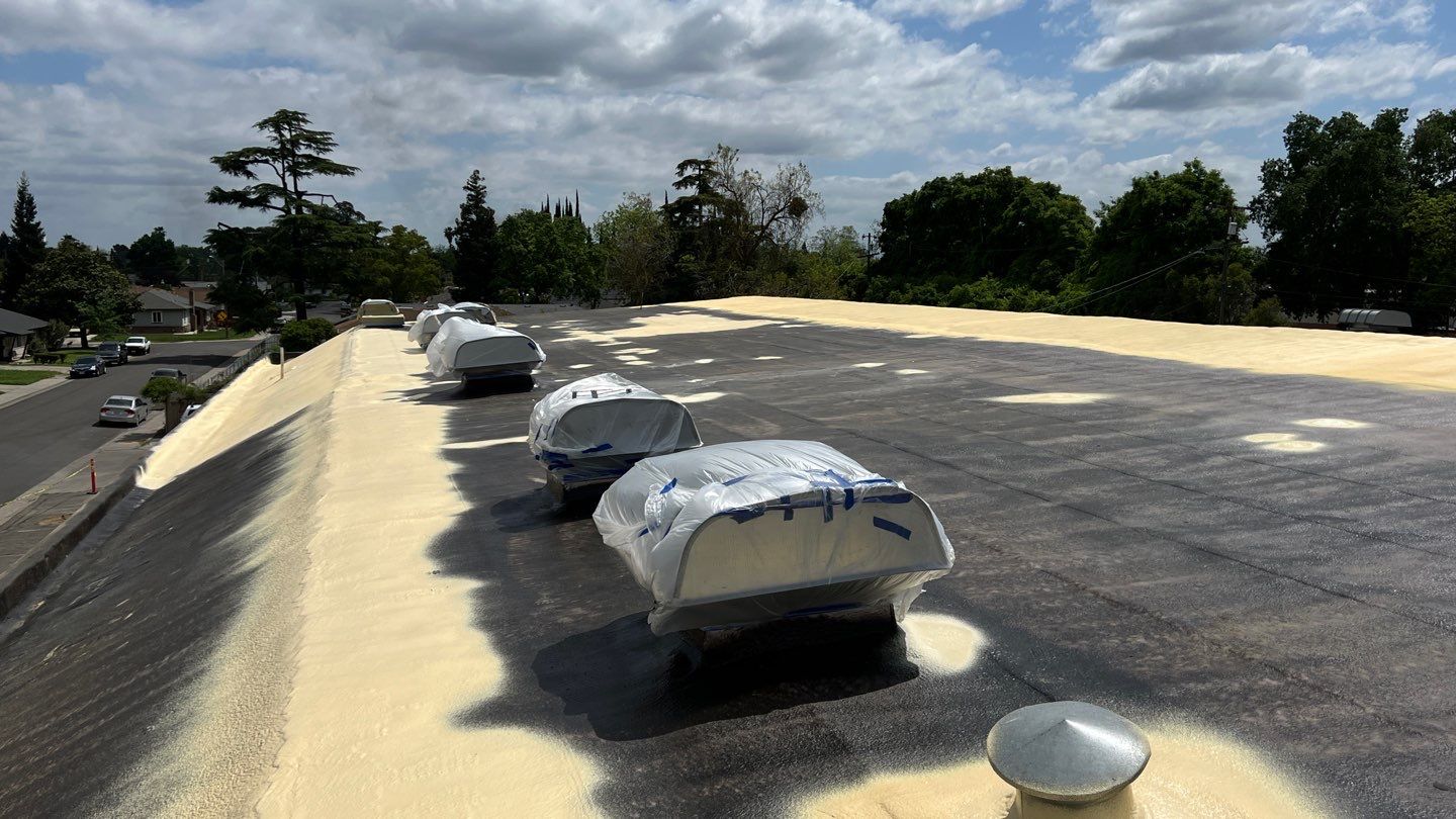 Foam Refurbish using Conklin Benchmark/PUMA XL coatings and spray foam by Straight Edge Roofing Inc