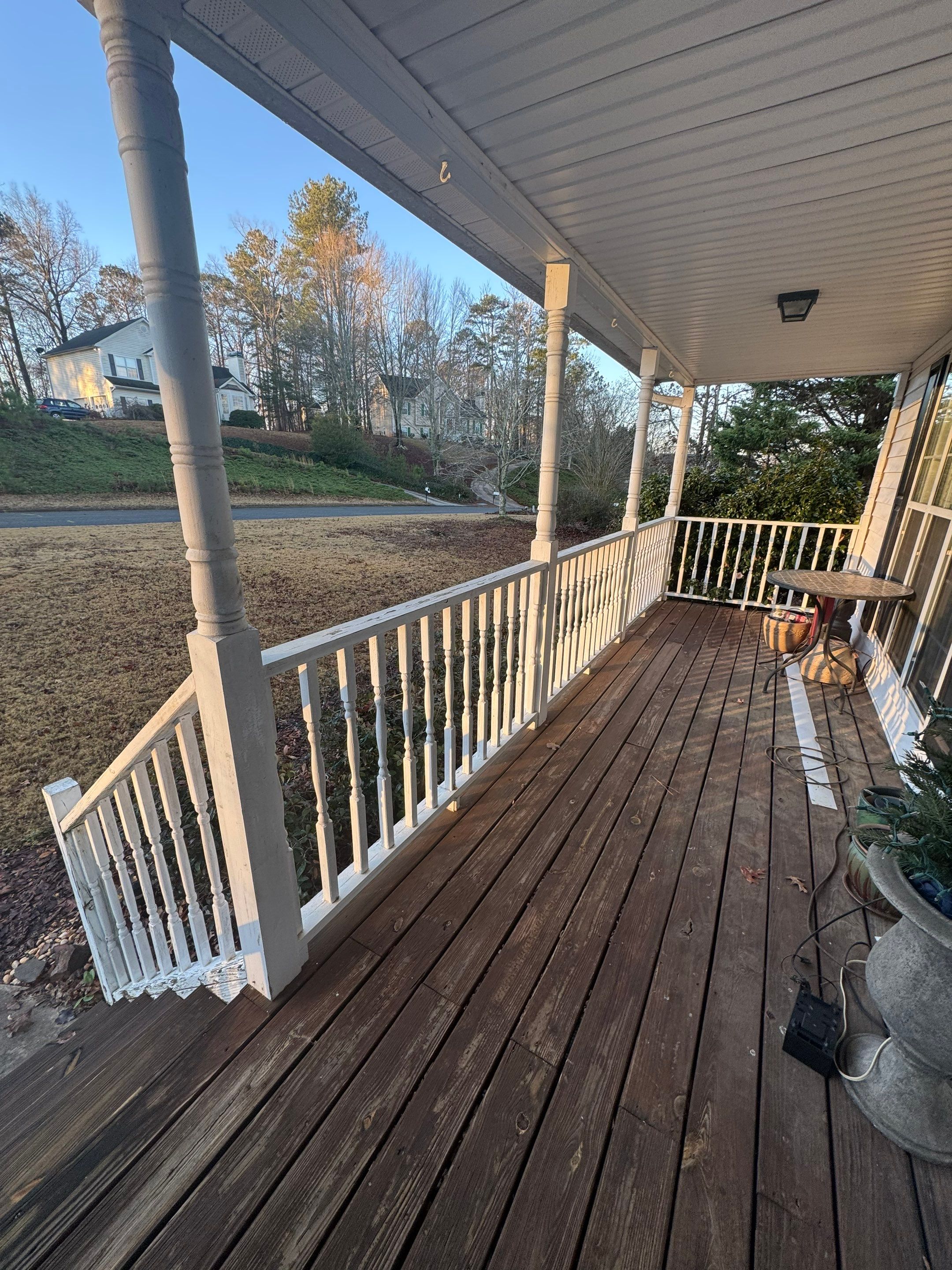 Pressure-Treated Porch Railing and Staircase Upgrade in Cumming by Swift Home Renovations