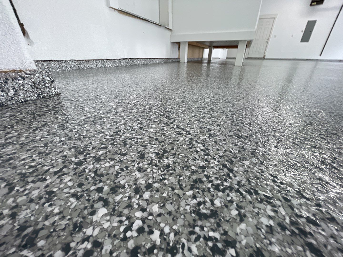 Garage Transformation using Slate Stone by Croc Coatings, LLC