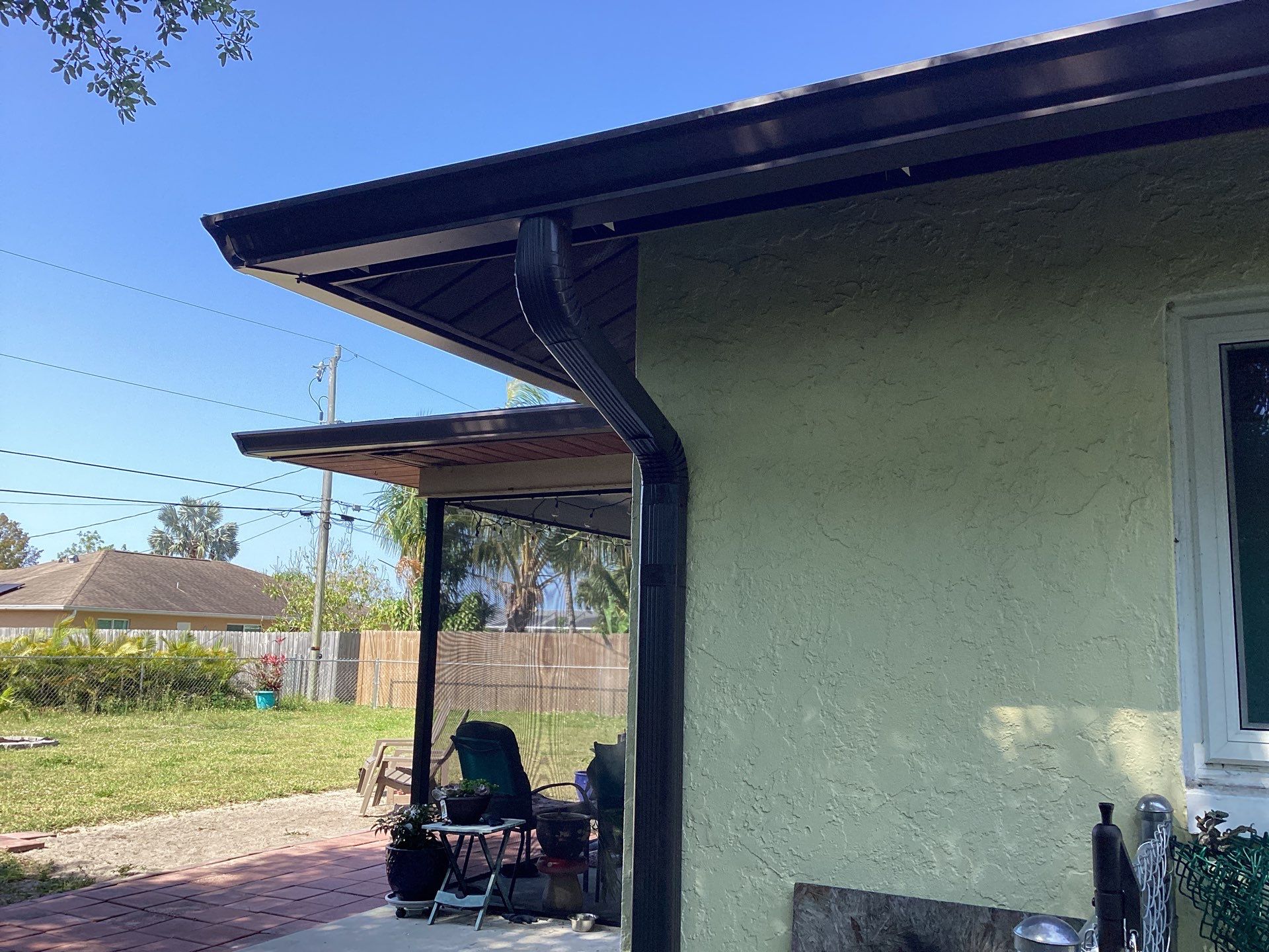 Musket Brown Seamless Gutters using 6 Inch Seamless Gutters in Cape Coral FL by Gutter Professors
